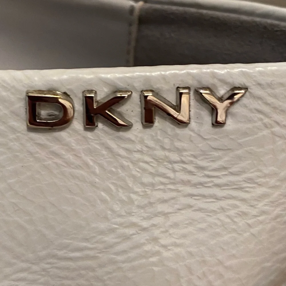 DKNY Women's Orza faux leather slip-on Shoes blue halogen size 9.5.